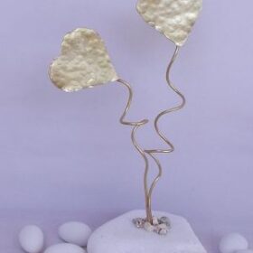 μπομπονιέρα 2 καρδιές σε βότσαλο